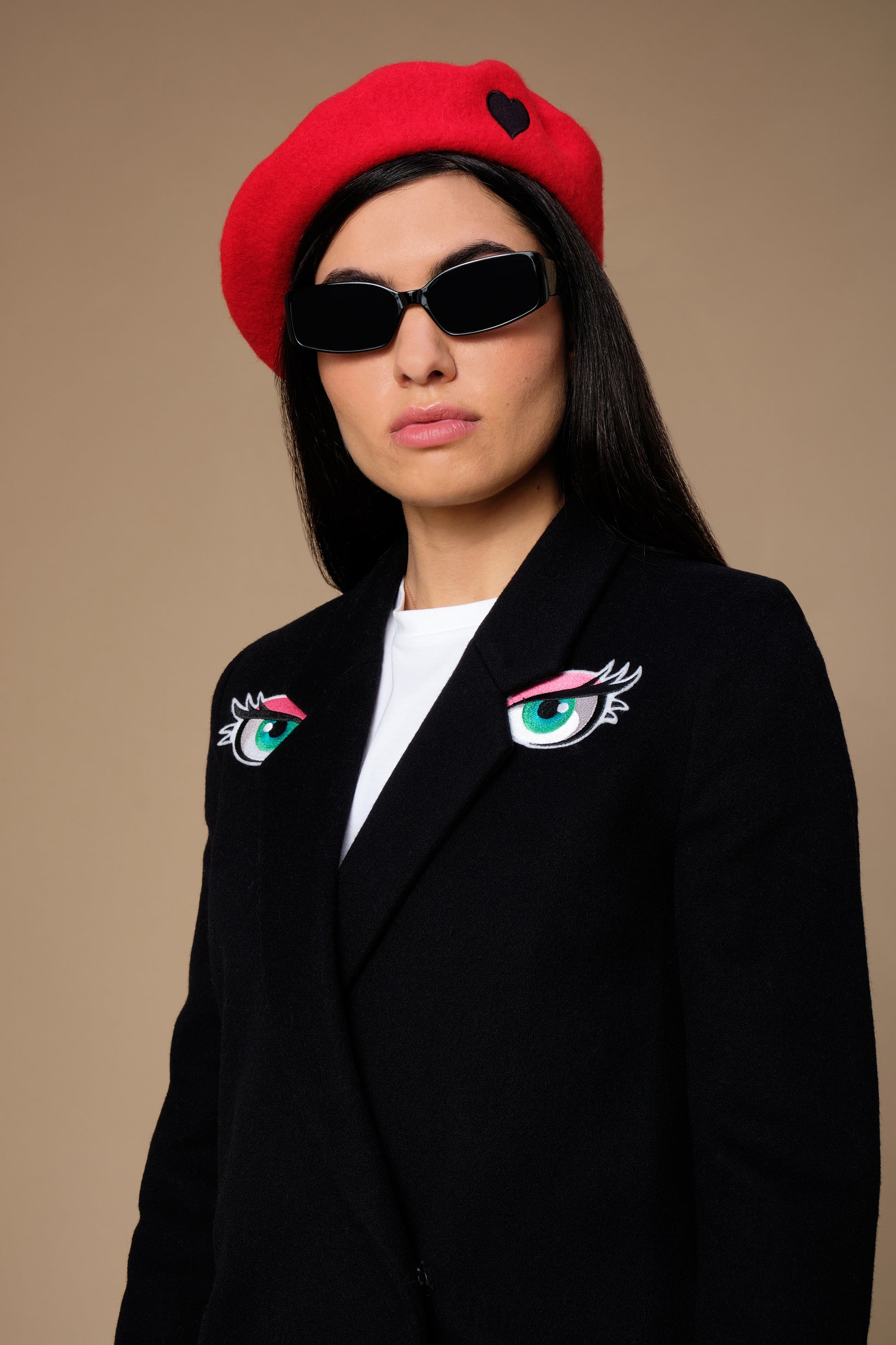 stillsveta black wool coat with blue eyes embroidery