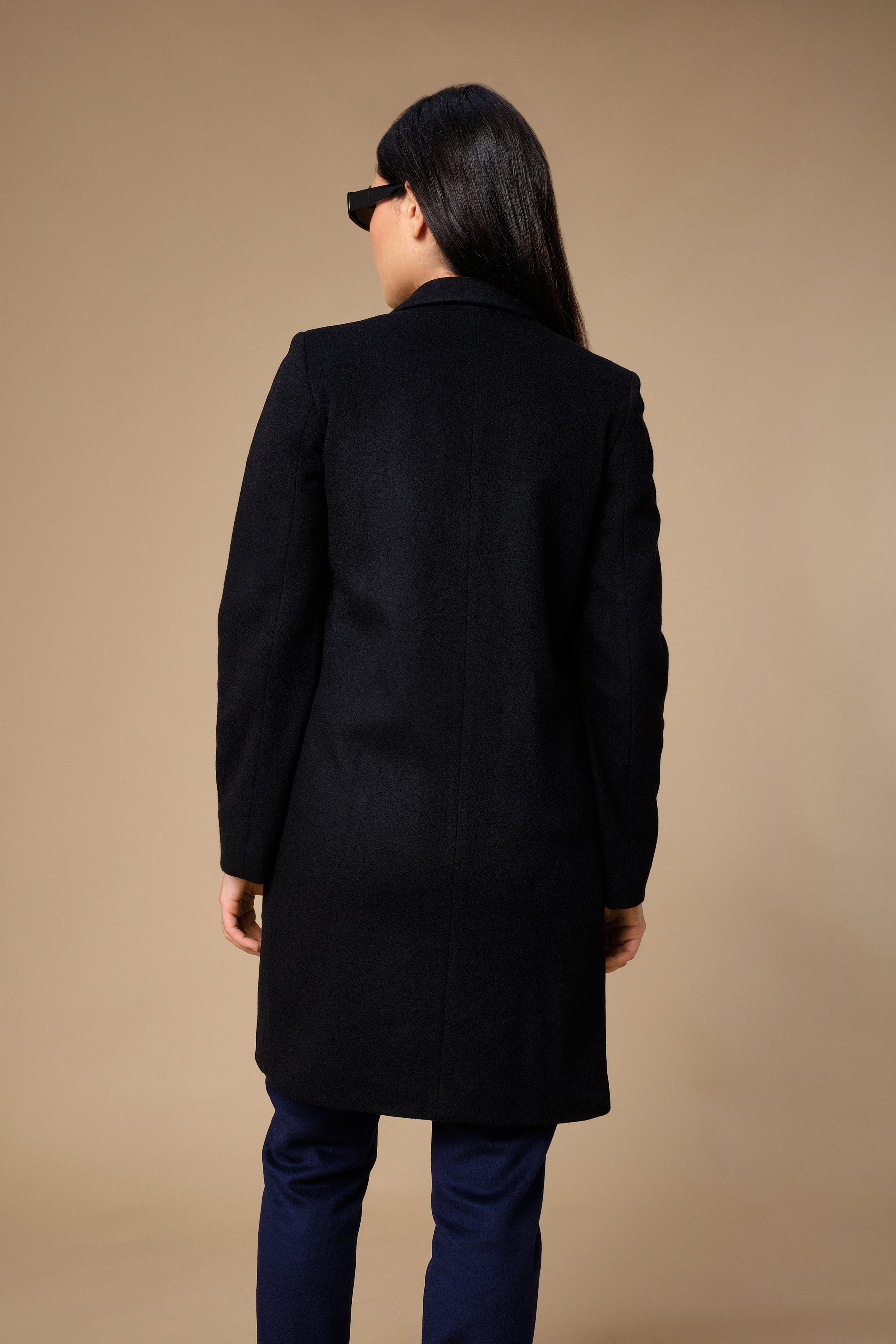 stillsveta black wool coat with blue eyes embroidery